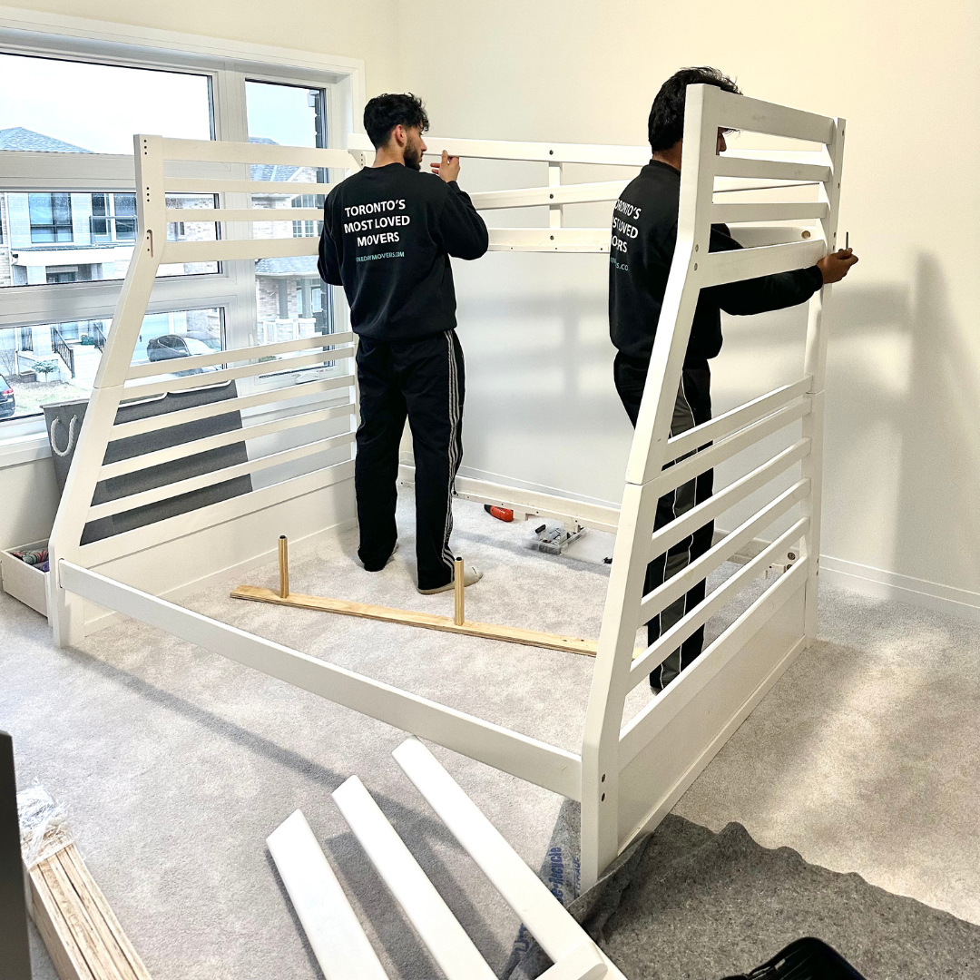 Kids room being adjusted during move by One Day Movers