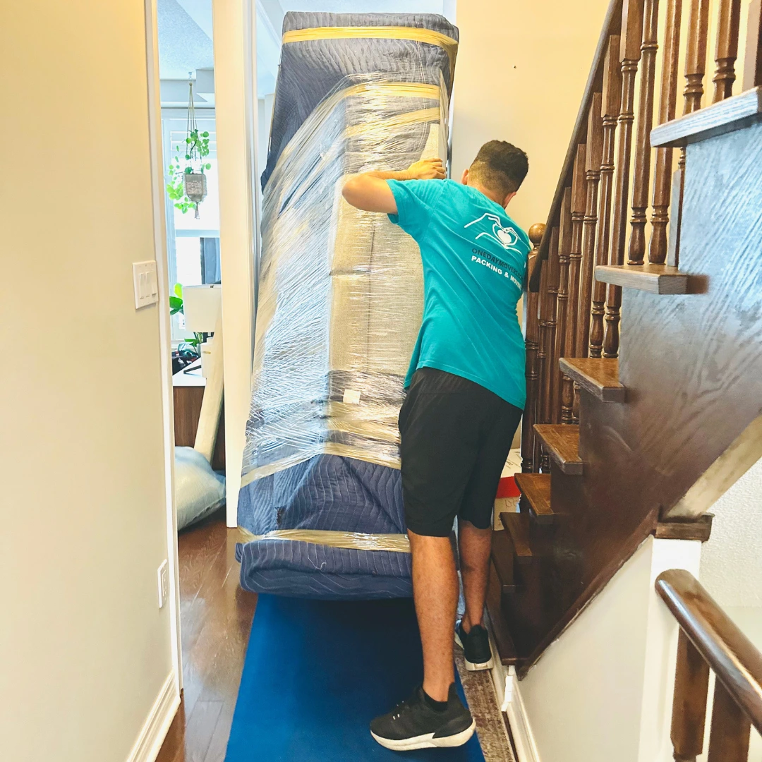 Expert movers navigating narrow stairs and tight spaces